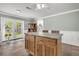Bright eat-in kitchen with center island and view to backyard at 200 Wappoo Rd, Charleston, SC 29407