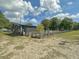 Outdoor community garden with fencing and raised garden beds, featuring a mix of plants and greenery at 2060 Wappoo Hall Rd, Charleston, SC 29412