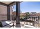 Outdoor balcony with seating offers a peaceful retreat and a charming neighborhood view at 21 George St # 206, Charleston, SC 29401