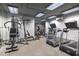 Well-equipped gym featuring modern treadmills, weights, and a multi-station for a complete fitness experience at 21 George St # 206, Charleston, SC 29401