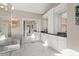 Bright bathroom boasts a glass-enclosed shower, soaking tub, and dual vanities with granite countertops at 2105 Loblolly Ln, Seabrook Island, SC 29455