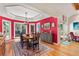 Elegant dining room with large windows, tray ceiling and view of the water at 2105 Loblolly Ln, Seabrook Island, SC 29455
