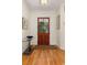 Inviting entryway featuring hardwood floors, decorative glass door, and elegant decor at 2105 Loblolly Ln, Seabrook Island, SC 29455