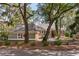 Charming single-story home with mature landscaping and a welcoming front entrance and cozy curb appeal at 2105 Loblolly Ln, Seabrook Island, SC 29455