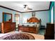 Spacious bedroom featuring wood trim, a ceiling fan, and a large wooden dresser at 222 Sinclair Rd, Summerville, SC 29483