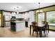 Modern kitchen featuring white cabinets, stainless steel appliances, and an island with bar seating at 222 Sinclair Rd, Summerville, SC 29483