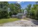 Aerial view of a brick home with mature trees on a large lot at 2340 Ashley River Rd, Charleston, SC 29414