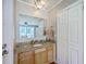 Bathroom with granite countertop and combination tub and shower at 2340 Ashley River Rd, Charleston, SC 29414