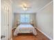 Cozy bedroom with hardwood floors and natural light at 2340 Ashley River Rd, Charleston, SC 29414