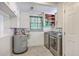 Bright laundry room with modern washer and dryer at 2340 Ashley River Rd, Charleston, SC 29414