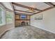 Living room features a brick fireplace and stylish slate floors at 2340 Ashley River Rd, Charleston, SC 29414