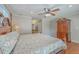 Well-lit main bedroom with hardwood floors and attached bathroom at 2340 Ashley River Rd, Charleston, SC 29414