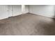 This bedroom features a light colored carpet and a double-door closet at 242 Daniels Creek Cir, Goose Creek, SC 29445