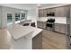 Modern kitchen with stainless steel appliances, countertops and backyard access at 242 Daniels Creek Cir, Goose Creek, SC 29445