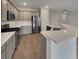 Modern kitchen with stainless steel appliances, countertops and adjacent dining area at 242 Daniels Creek Cir, Goose Creek, SC 29445