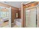 This bathroom features a soaking tub and a glass enclosed shower at 2488 Stadium Dr, North Charleston, SC 29406