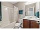 This bathroom features a shower over tub and single sink vanity at 2488 Stadium Dr, North Charleston, SC 29406