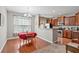 Bright dining area featuring hardwood floors and a stylish chandelier at 2488 Stadium Dr, North Charleston, SC 29406