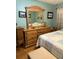 Bedroom showcasing a wooden dresser, hardwood floors and a bed at 277 Carolina Cir, Walterboro, SC 29488