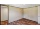 Bedroom with hardwood floors, a neutral color scheme, and easy access to other areas of the home at 282 Marion Rd, Dorchester, SC 29437