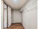 Spacious closet with wooden floors, wire shelving, and an open door to the bathroom at 282 Marion Rd, Dorchester, SC 29437