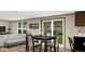 Inviting dining area with modern table, chairs, and sliding glass doors, perfect for entertaining at 282 Marion Rd, Dorchester, SC 29437