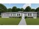 Charming single-story home with gray siding, well-manicured lawn, and inviting landscaping at 282 Marion Rd, Dorchester, SC 29437