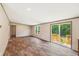 Bright and airy living room with hardwood floors and sliding glass doors leading to an outdoor area at 282 Marion Rd, Dorchester, SC 29437
