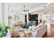 Elegant living room featuring hardwood floors, comfortable seating, and stylish decor at 3 Cross Ln, Isle of Palms, SC 29451
