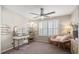 Cozy bedroom featuring a unique pink chair, vanity, and a ceiling fan for added comfort at 301 Dunlin Dr, Summerville, SC 29486