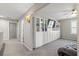 Bright bonus room with large built-in shelves and cabinets for storage and organization at 301 Dunlin Dr, Summerville, SC 29486