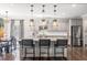 Bright kitchen with granite countertops, stainless steel appliances, and an island with seating at 301 Dunlin Dr, Summerville, SC 29486