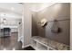 Convenient mudroom area with a built-in bench, coat hooks, and easy access to the kitchen at 301 Dunlin Dr, Summerville, SC 29486