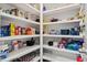 Spacious walk-in pantry with built-in shelves, offering ample storage for all your kitchen needs at 301 Dunlin Dr, Summerville, SC 29486