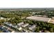 Overhead shot of the community showcasing townhomes, surrounding trees and nearby facilities at 304 Pathfinder Way, Charleston, SC 29492