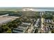 Scenic aerial view of a neighborhood by a river, surrounded by lush green trees at 304 Pathfinder Way, Charleston, SC 29492