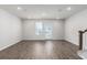 Inviting living room with plenty of natural light and hardwood floors at 304 Pathfinder Way, Charleston, SC 29492