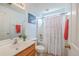 Full bathroom with vanity, toilet and shower tub with a white shower curtain at 309 Harriswood Ln, Moncks Corner, SC 29461