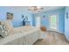 Blue-themed bedroom with multiple windows providing natural light at 309 Harriswood Ln, Moncks Corner, SC 29461