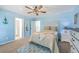 Bedroom featuring carpet, a ceiling fan, and an attached bathroom at 309 Harriswood Ln, Moncks Corner, SC 29461