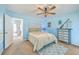 Blue themed bedroom featuring a ceiling fan, and coastal-themed decor at 309 Harriswood Ln, Moncks Corner, SC 29461