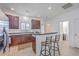 Bright kitchen featuring stainless steel appliances, bar seating, and neutral color scheme at 309 Harriswood Ln, Moncks Corner, SC 29461