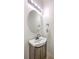 Small powder room featuring a vanity with a vessel sink and decorative oval mirror at 309 Harriswood Ln, Moncks Corner, SC 29461