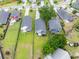 Aerial view showcasing the property, surrounding neighborhood and manicured lawns at 3257 Timberline Dr, Johns Island, SC 29455