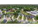 Aerial view of homes in the neighborhood surrounded by mature trees and green spaces at 3257 Timberline Dr, Johns Island, SC 29455