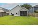 Spacious backyard and screened in patio offer ample outdoor living space at 3257 Timberline Dr, Johns Island, SC 29455