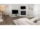 Comfortable living room featuring a fireplace and abundant natural light at 3257 Timberline Dr, Johns Island, SC 29455