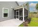 Rear exterior view of the home featuring a screened in porch at 3257 Timberline Dr, Johns Island, SC 29455