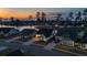Aerial view of homes near the lake with dark rooftops and beautiful sky during sunset at 357 Tupelo Lake Dr, Summerville, SC 29486