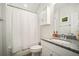 Clean bathroom with granite countertop vanity, bathtub and shower combination with white curtain at 357 Tupelo Lake Dr, Summerville, SC 29486